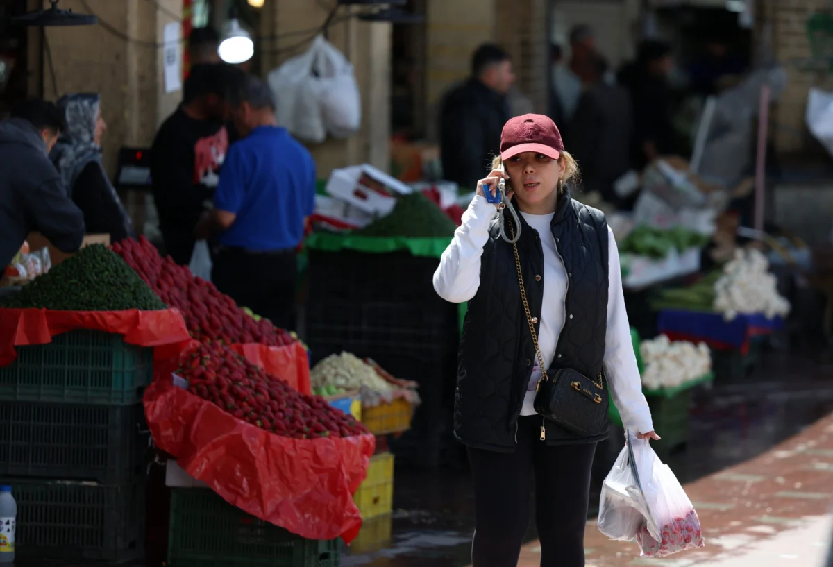 Iran Grapples with Economic Hardship and Unprecedented Internet Blackout Amidst Ongoing Conflict