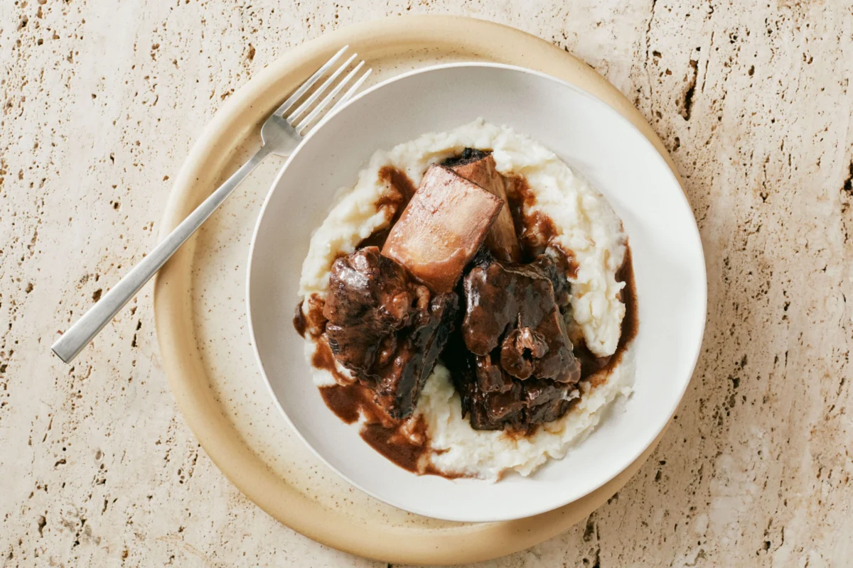 The Evolution and Technical Mastery of Red Wine Braised Short Ribs in Modern Gastronomy