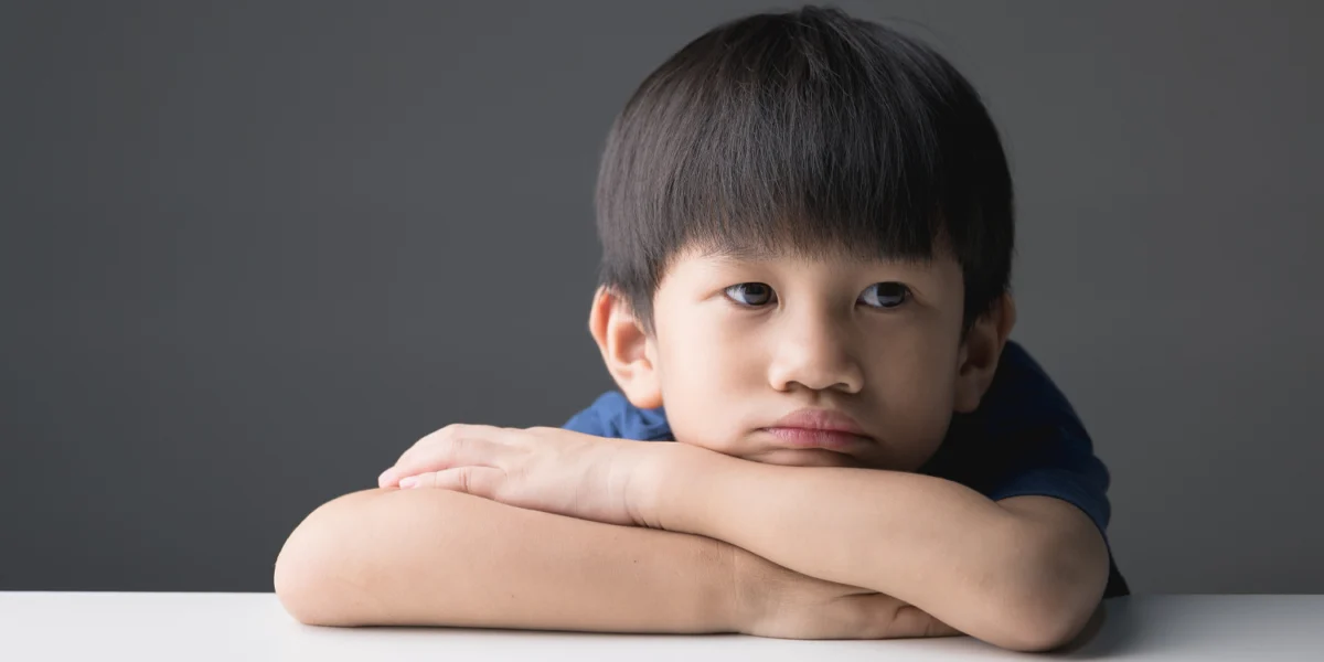 Longitudinal associations among autism and ADHD traits, social maladjustment, and mental health in school-aged children